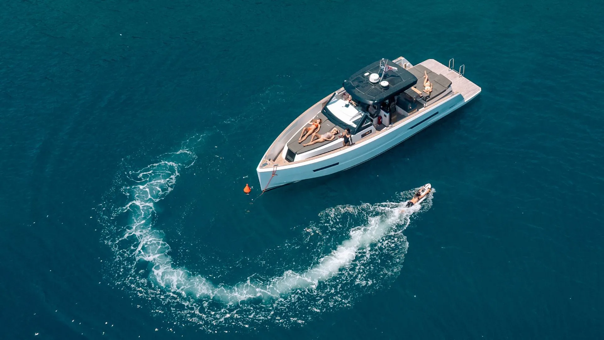 Luxury yacht aerial view in crystal clear Greek waters